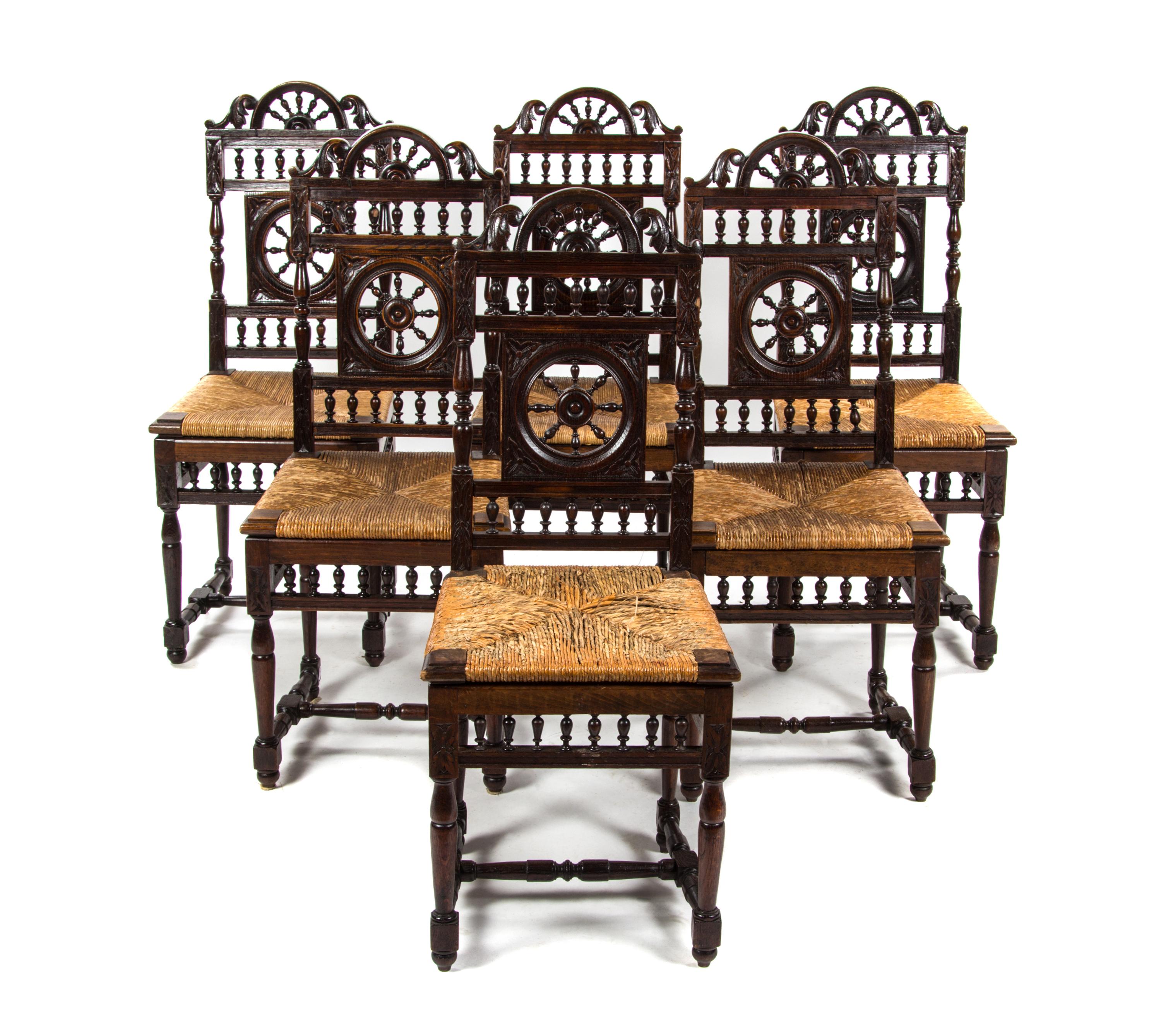 A Set of Six Brittany Oak Side Chairs, Height 40 1/4 inches.