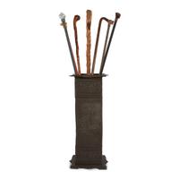Seven Walking Sticks and a Cast Metal Umbrella Stand