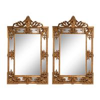 A Pair of Large Régence Style Giltwood Mirrors