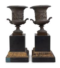 A Pair of Continental Bronze Urns with Associated Plinths