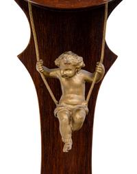 A Continental Oak Cased Wall Clock