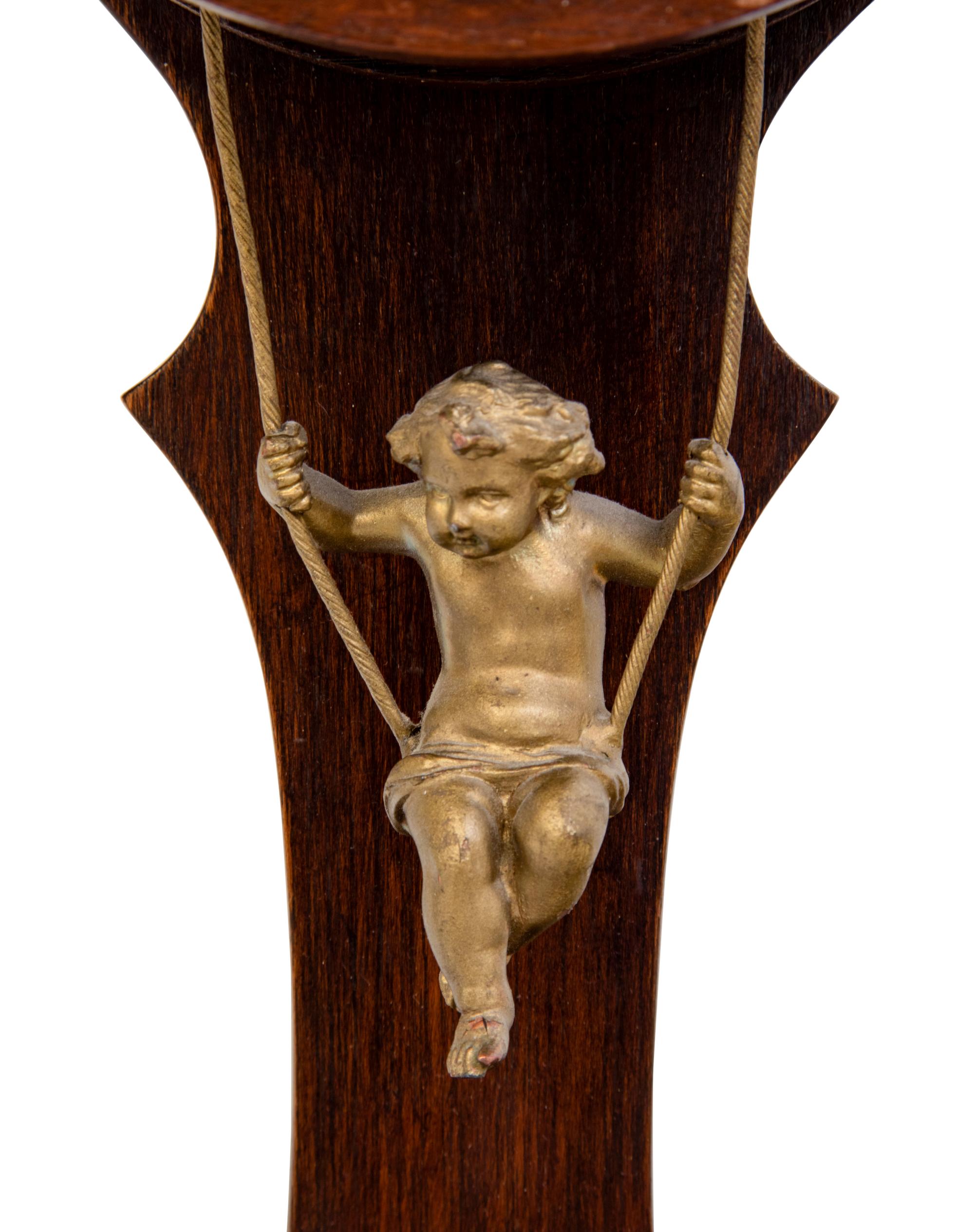 A Continental Oak Cased Wall Clock