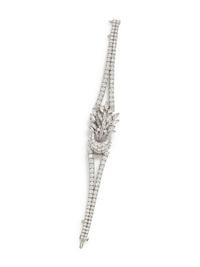 PLATINUM AND DIAMOND SURPRISE WATCH