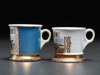 Two Automobile Related Porcelain Shaving Mugs