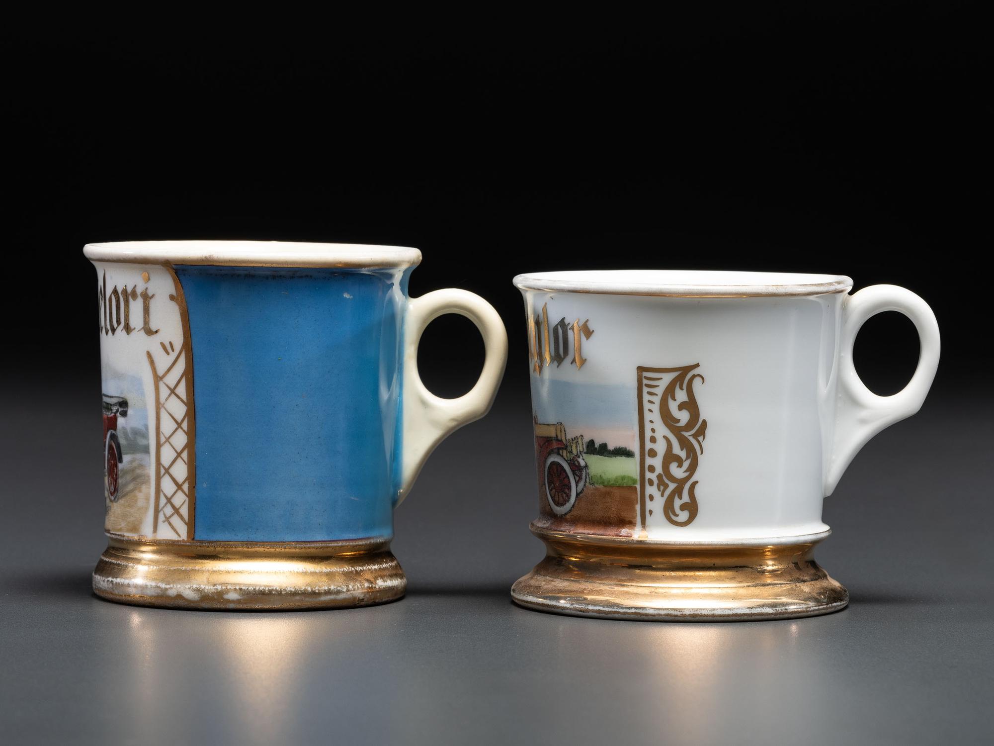Two Automobile Related Porcelain Shaving Mugs