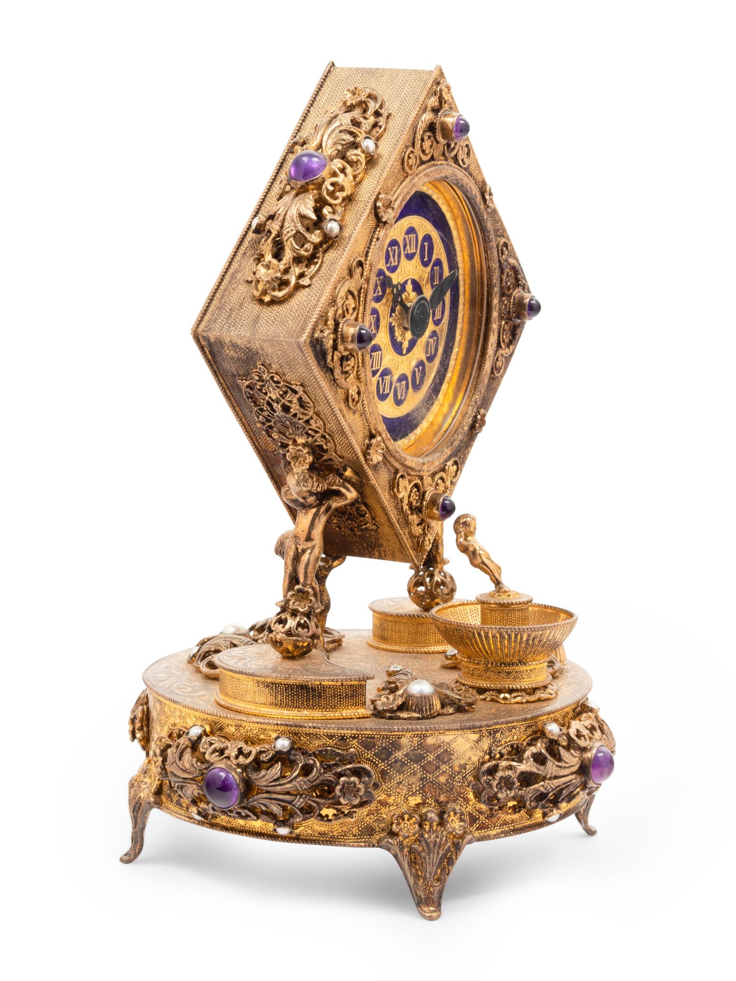 A Neoclassical Style Lapis Lazuli Inset Gilt Metal Mantel Clock