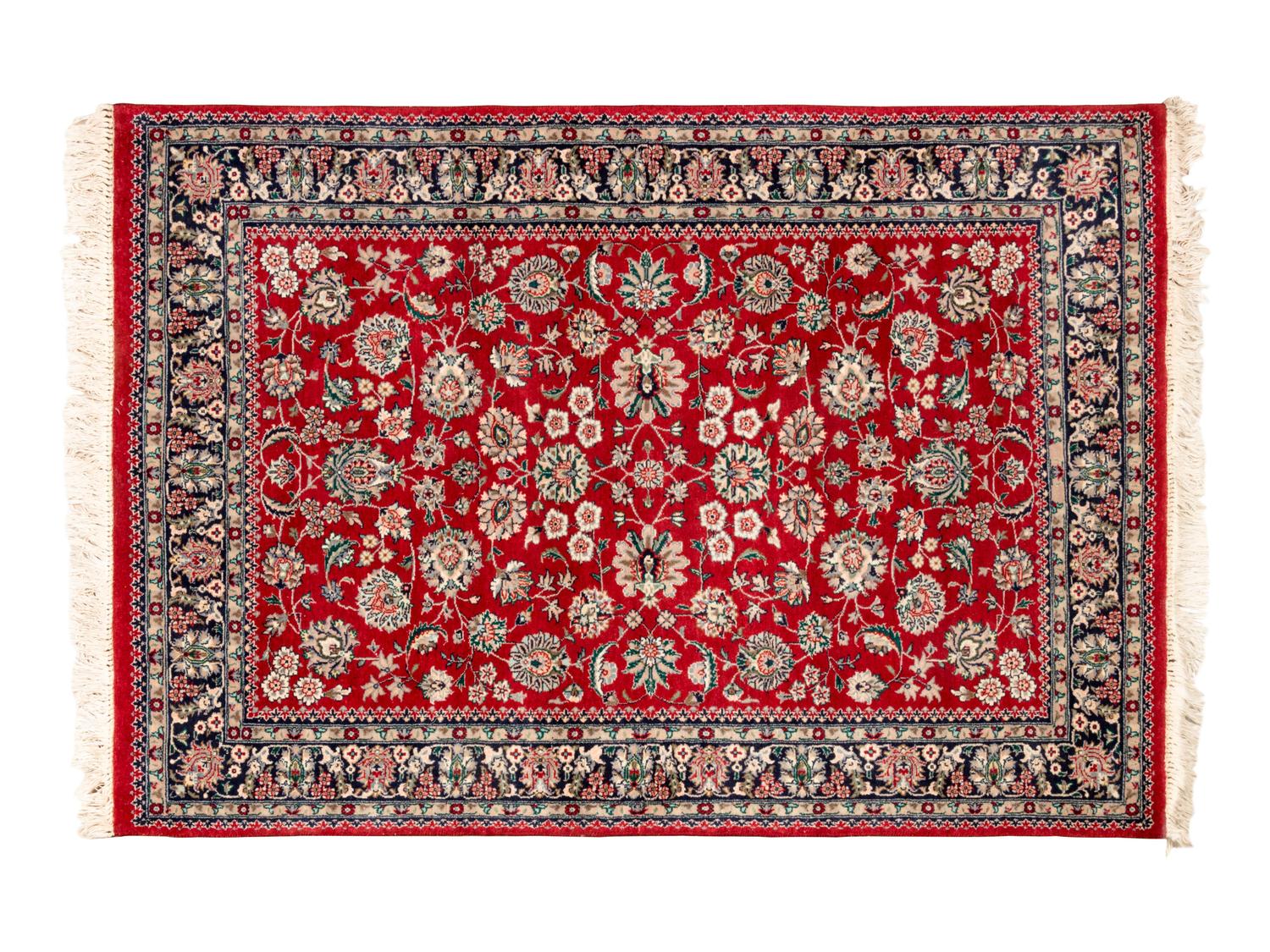 A Group of Persian Wool Rugs
