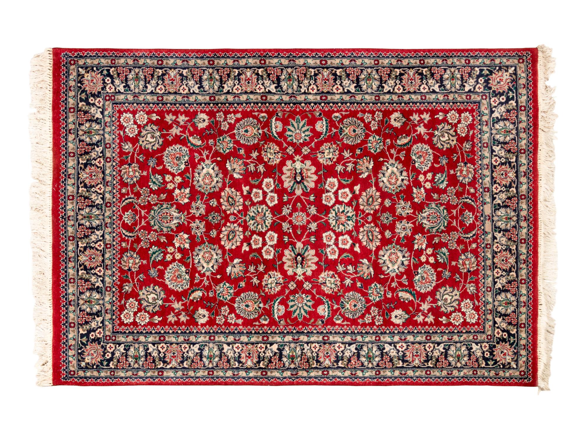 A Group of Persian Wool Rugs
