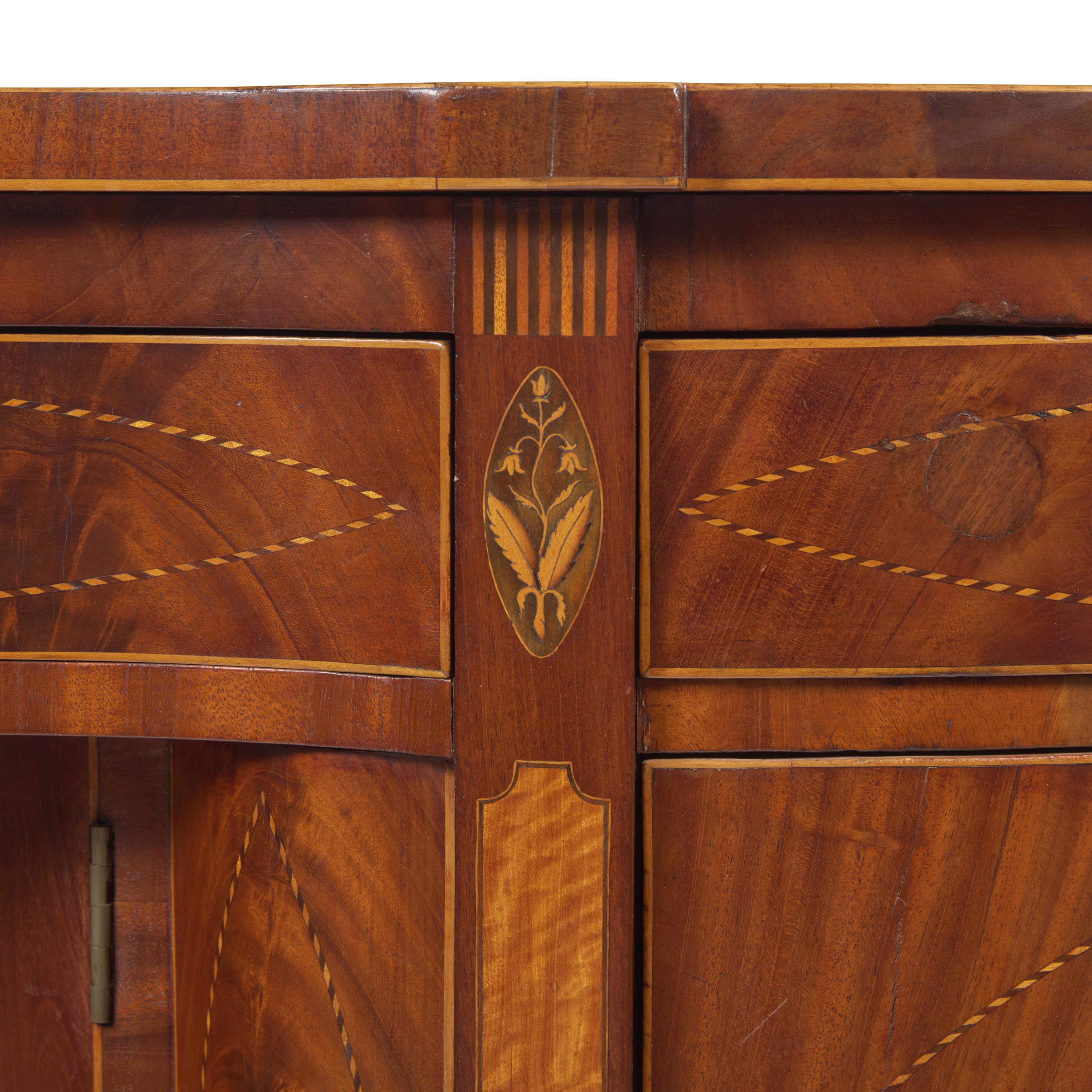 A Fine Federal Inlaid and Figured Mahogany Serpentine Sideboard