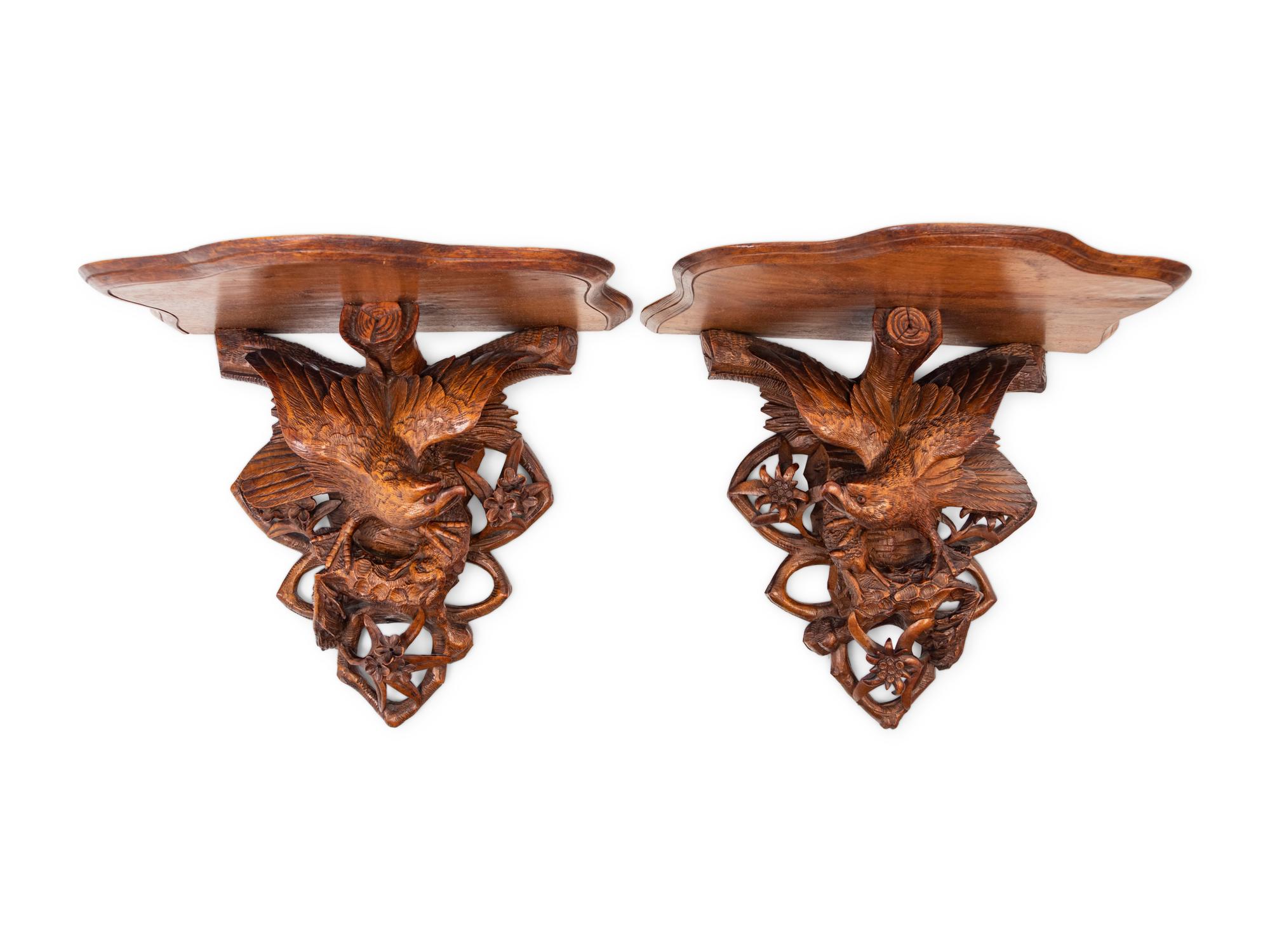 A Pair of Black Forest Style Carved Oak Wall Brackets