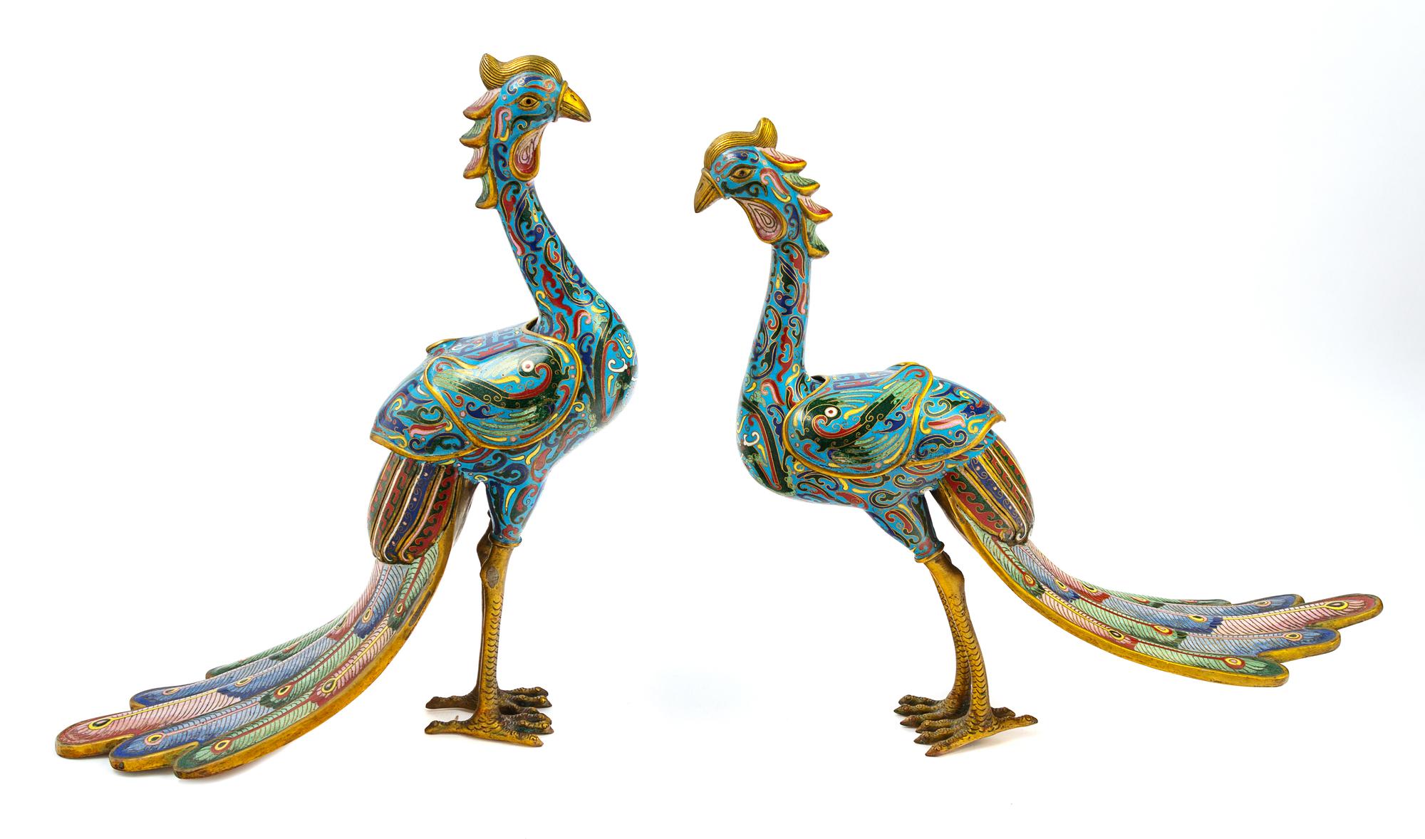 A Pair of Chinese Cloisonne Enamel Figures of Phoenix Height of taller 16 inches. — 20TH CENTURY