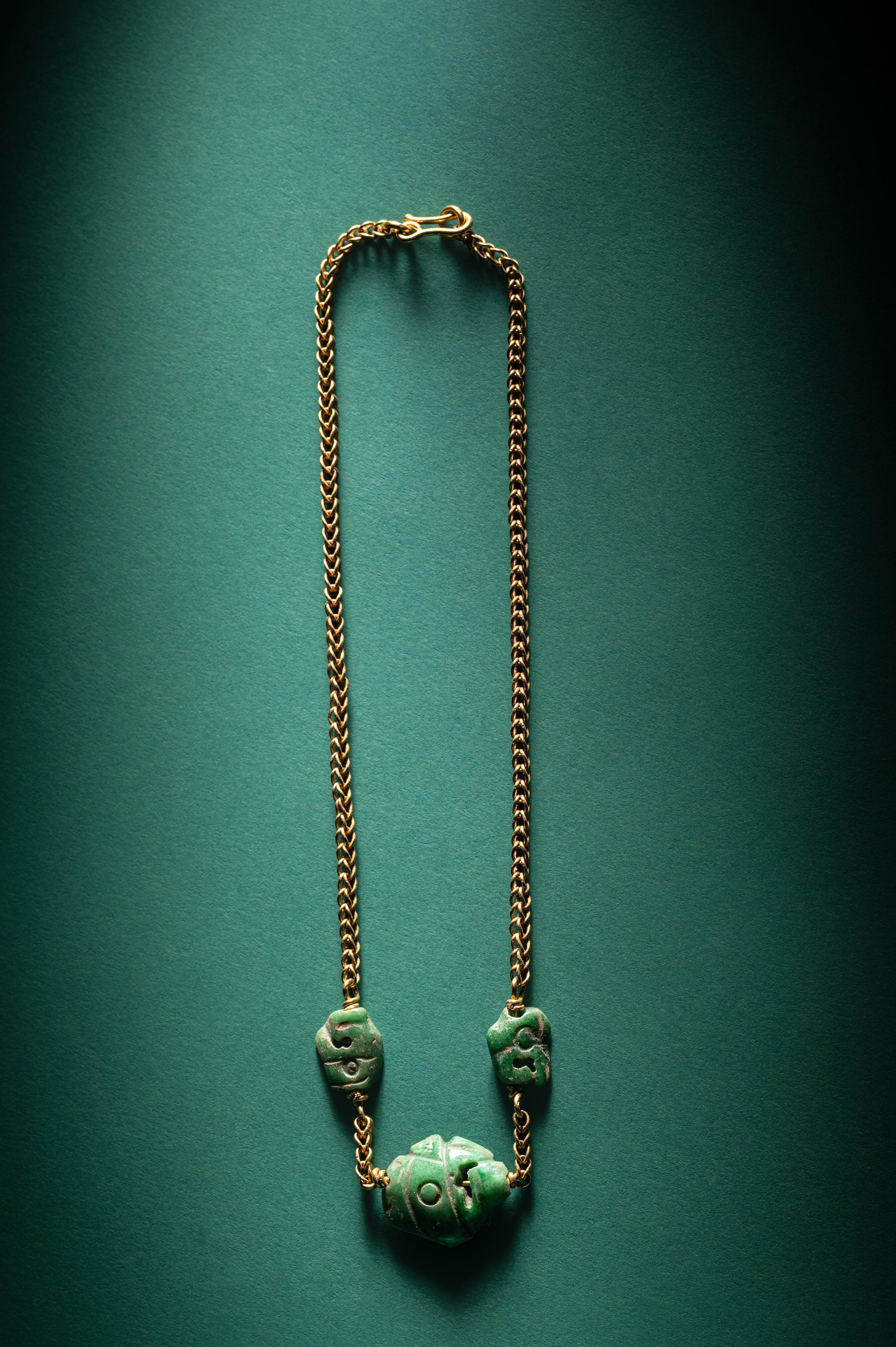 Three Maya Jade Parrot Pendants — Strung on a gold necklace