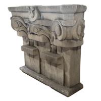 A Pair of Limestone Pilaster Capitals from the Chicago Mercantile Exchange Building 46" W x 14" D x 37.5" H — United States, Circa 1927