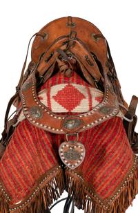 A Tooled Leather and Silver Adorned Parade Saddle