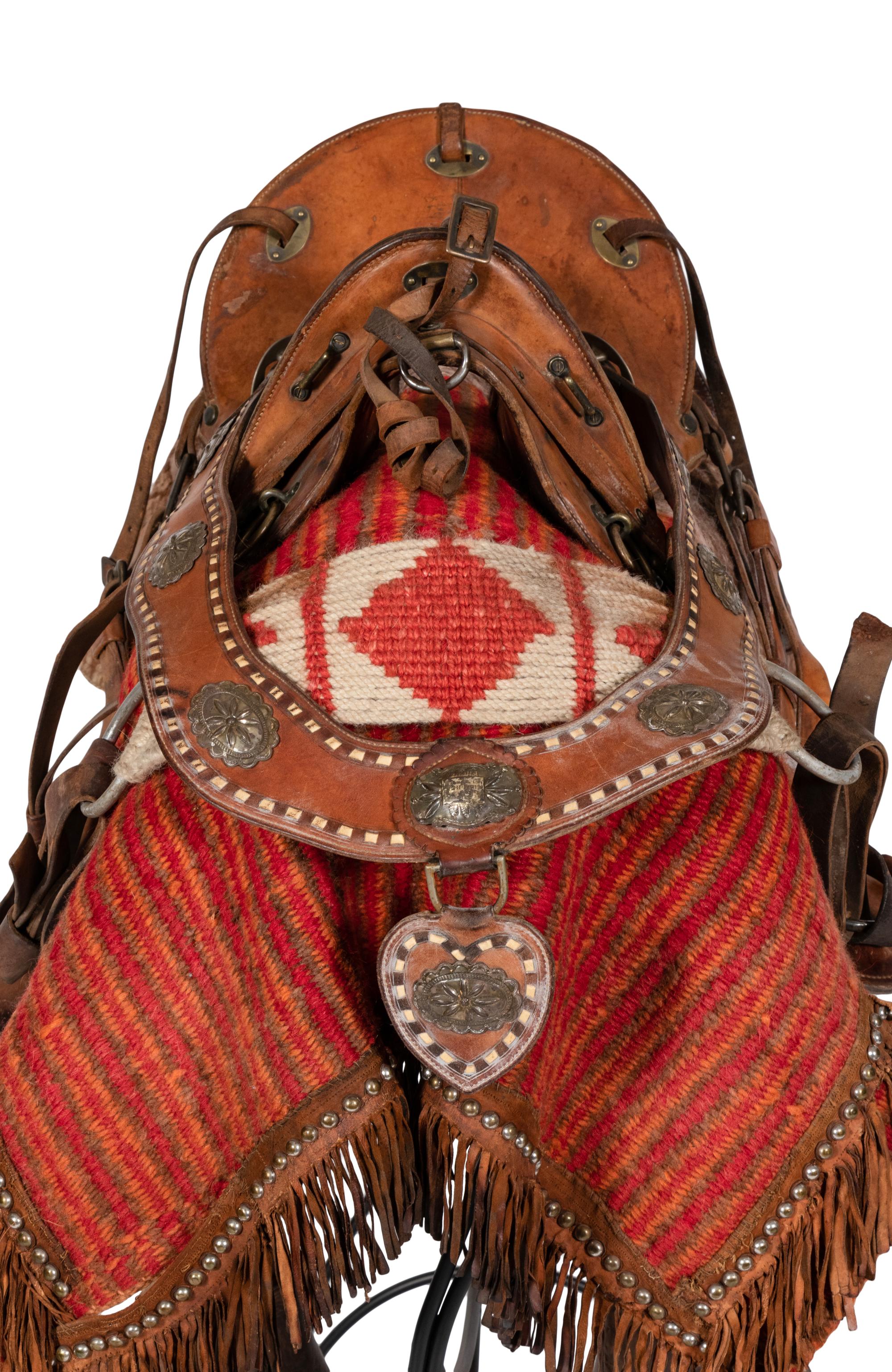 A Tooled Leather and Silver Adorned Parade Saddle