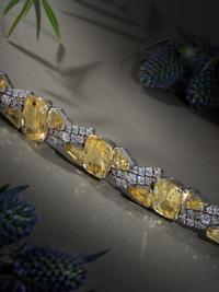OSCAR HEYMAN & BROTHERS, YELLOW SAPPHIRE AND DIAMOND BRACELET