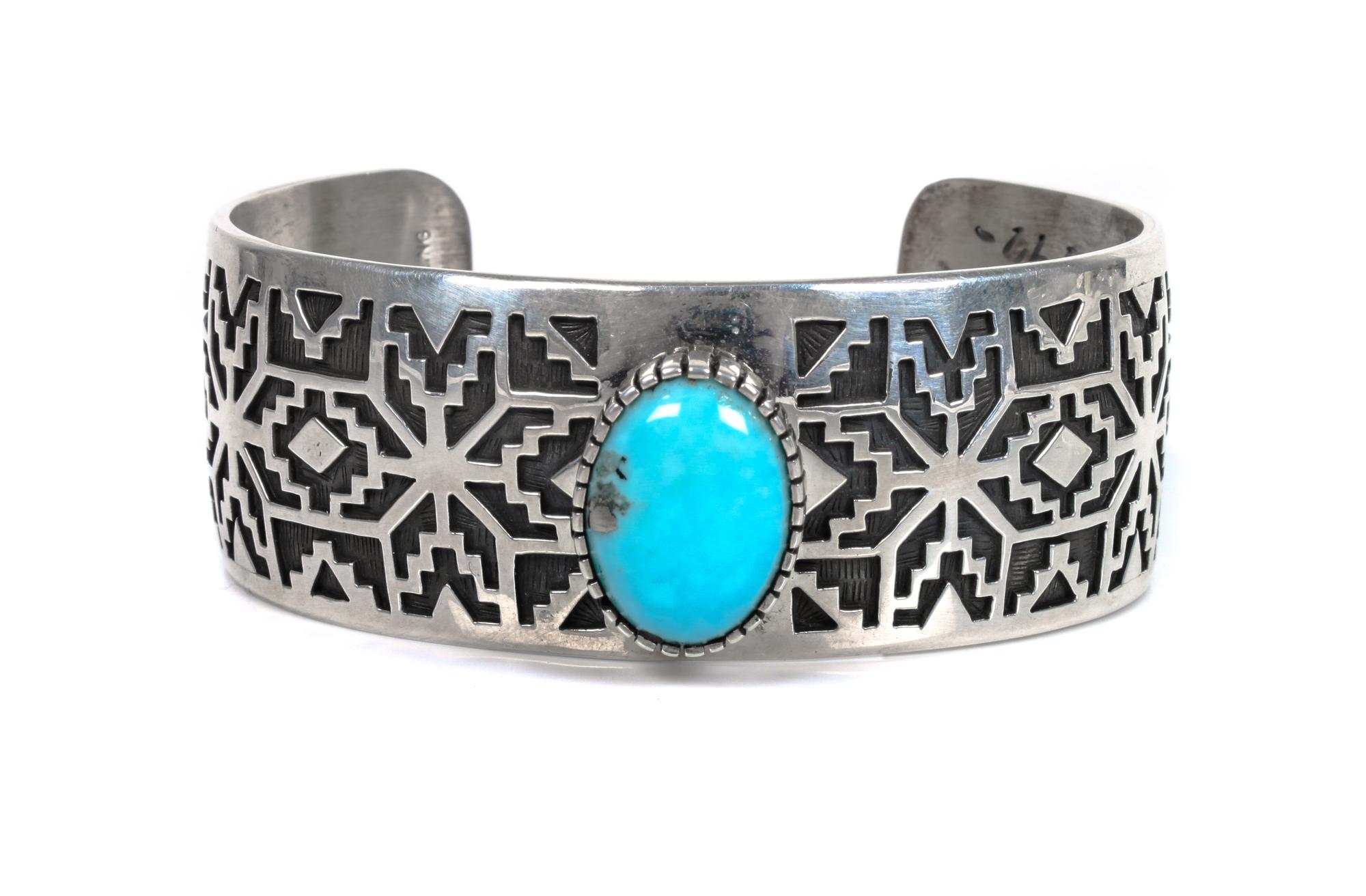 Three Southwestern Silver and Turquoise Cuff Bracelets Length of largest 5 1/2 x opening 1 1/2 inches.