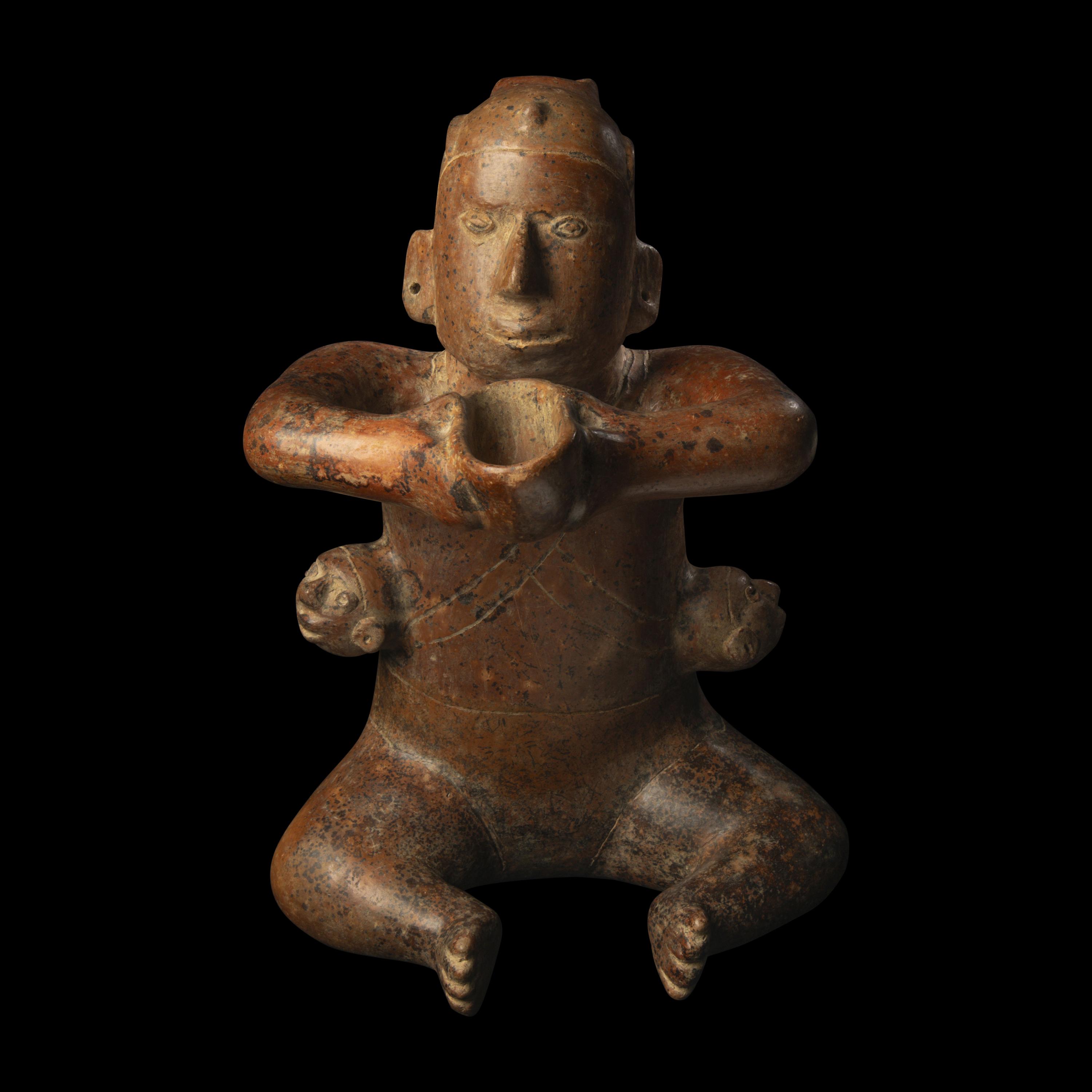 A Colima Terracotta Seated Figure
