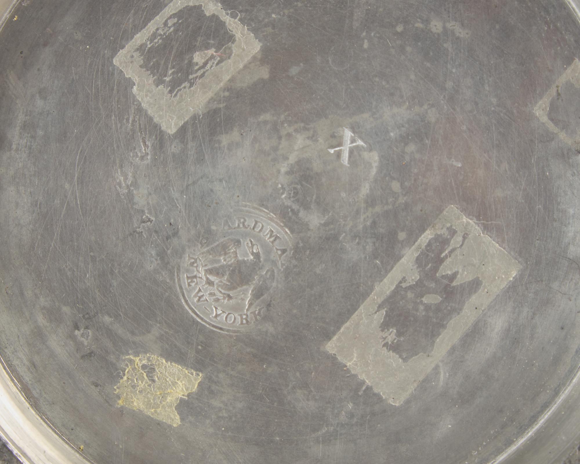 A Group of Six Pewter Table Items