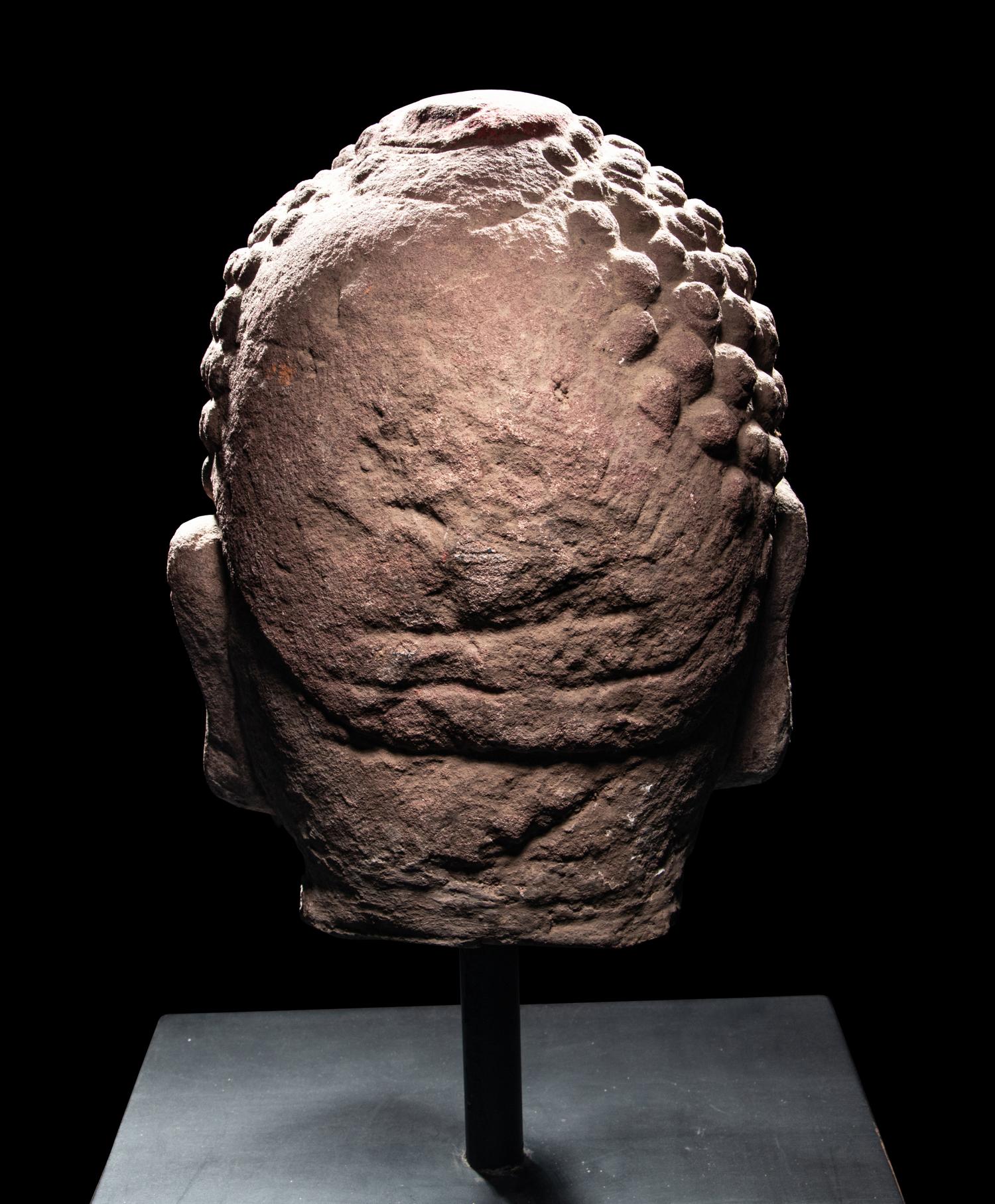 A Pair of Chinese Carved Stone Heads of Buddha