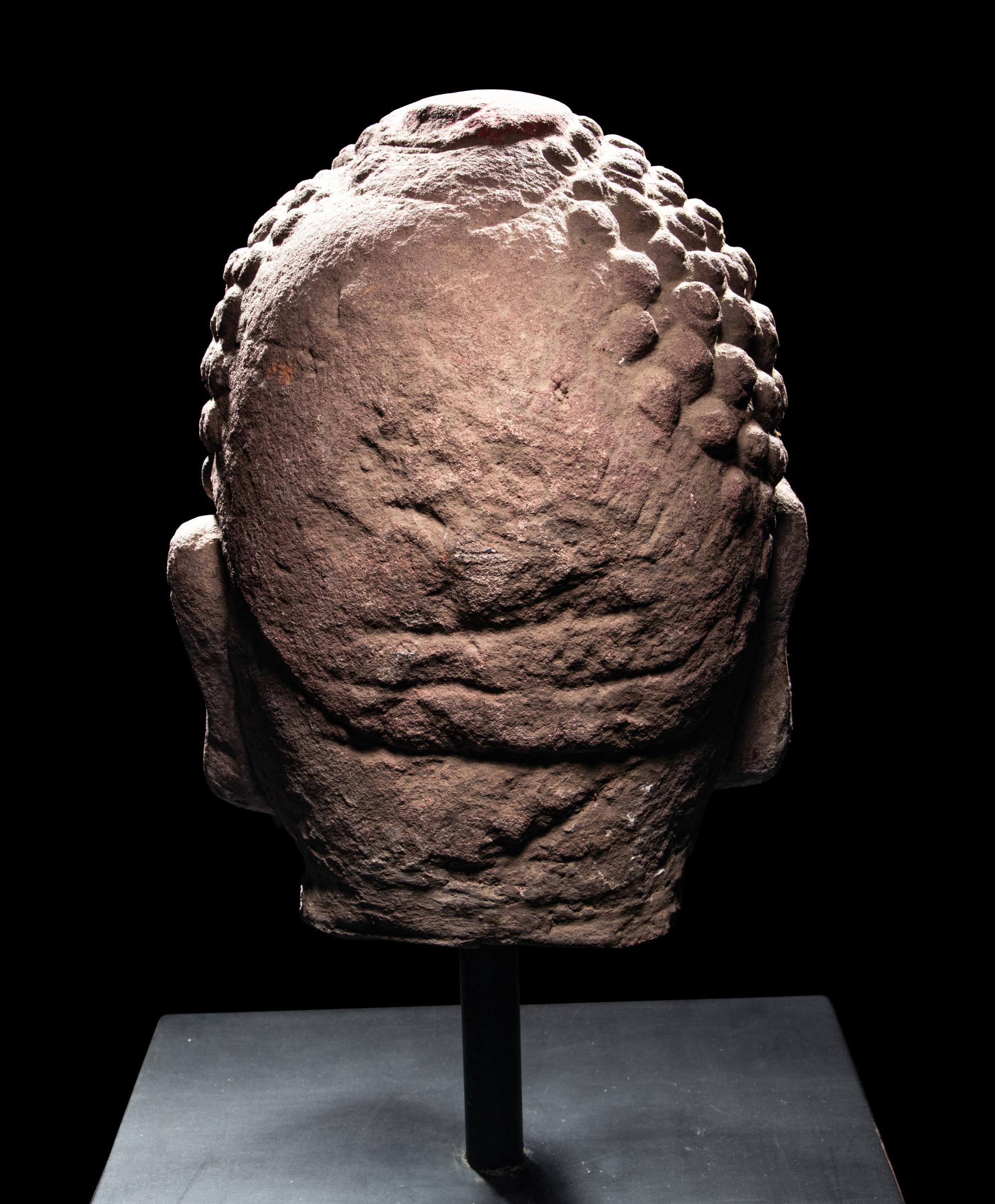 A Pair of Chinese Carved Stone Heads of Buddha