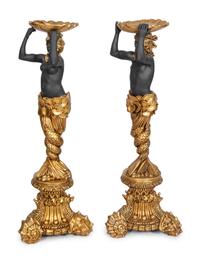 A Pair of Gilt and Black-Painted Torchère Figures of a Mermaid and Merman