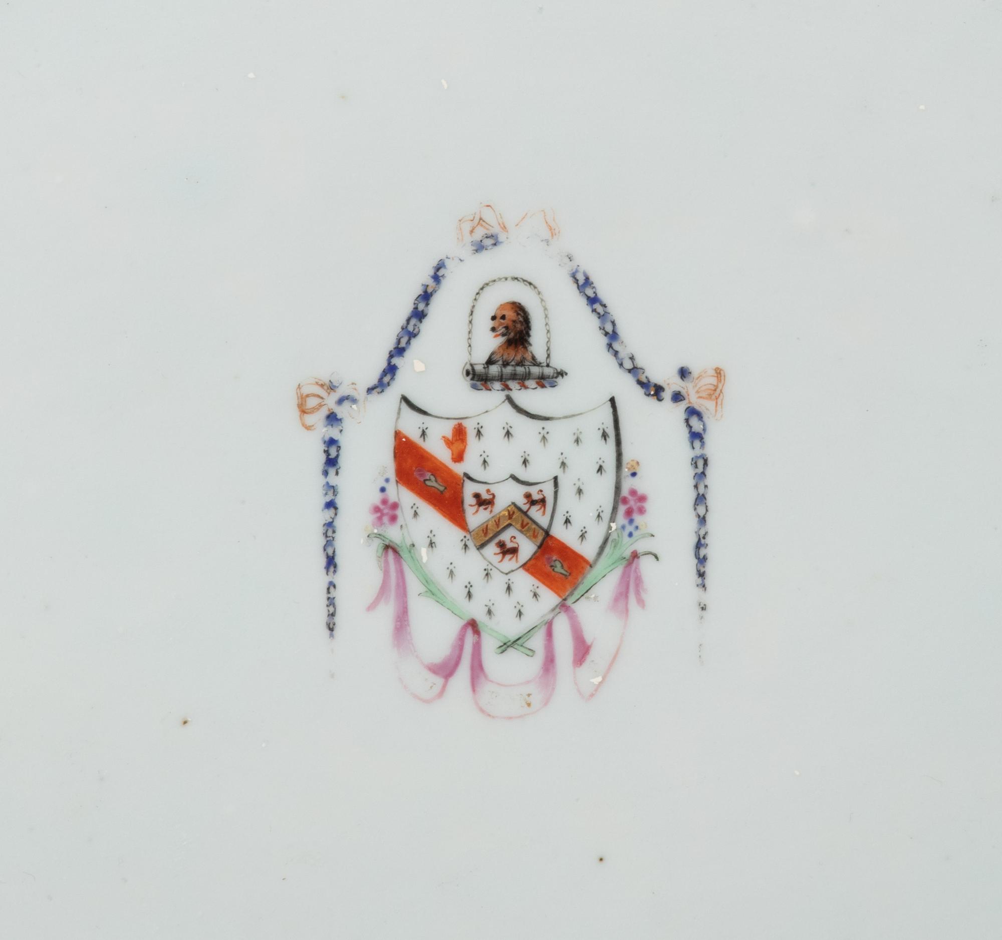 A Pair of Chinese Export Porcelain Armorial Platters Raised on Later Mahogany Stands