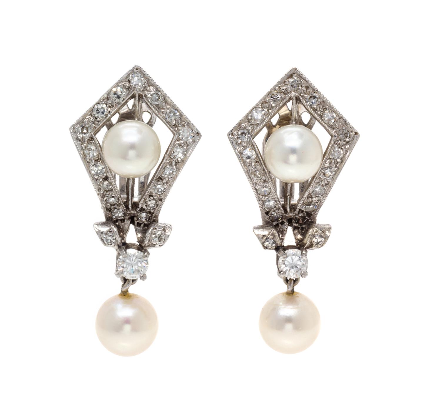 A Pair of White Gold, Cultured Pearl and Diamond Earclips, 6.50 dwts.