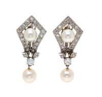 A Pair of White Gold, Cultured Pearl and Diamond Earclips, 6.50 dwts.