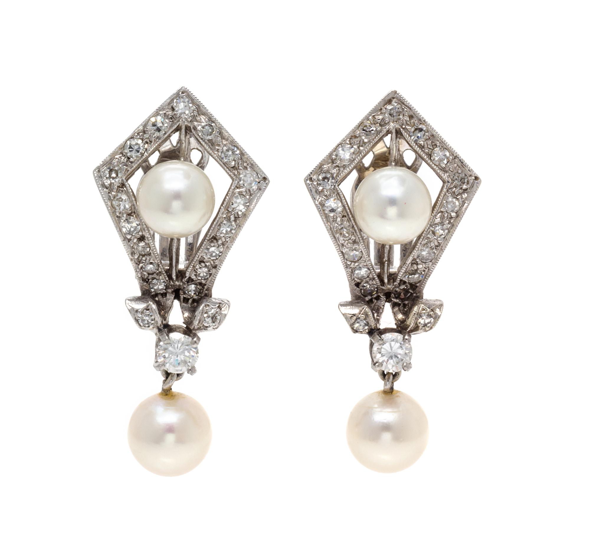 A Pair of White Gold, Cultured Pearl and Diamond Earclips, 6.50 dwts.