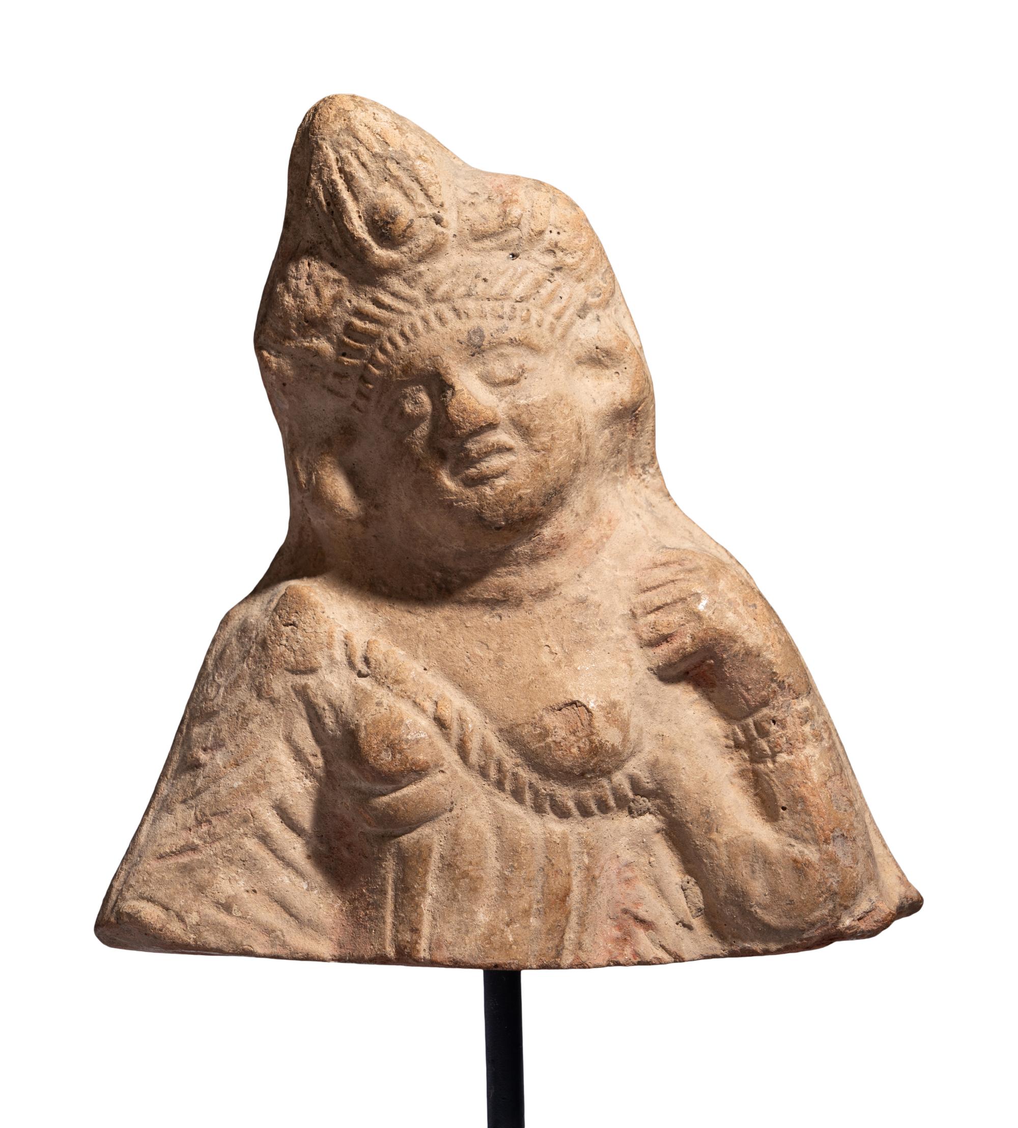 An Egyptian Terracotta Bust of Isis