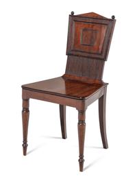 A Pair of William IV Carved Mahogany Hall Chairs