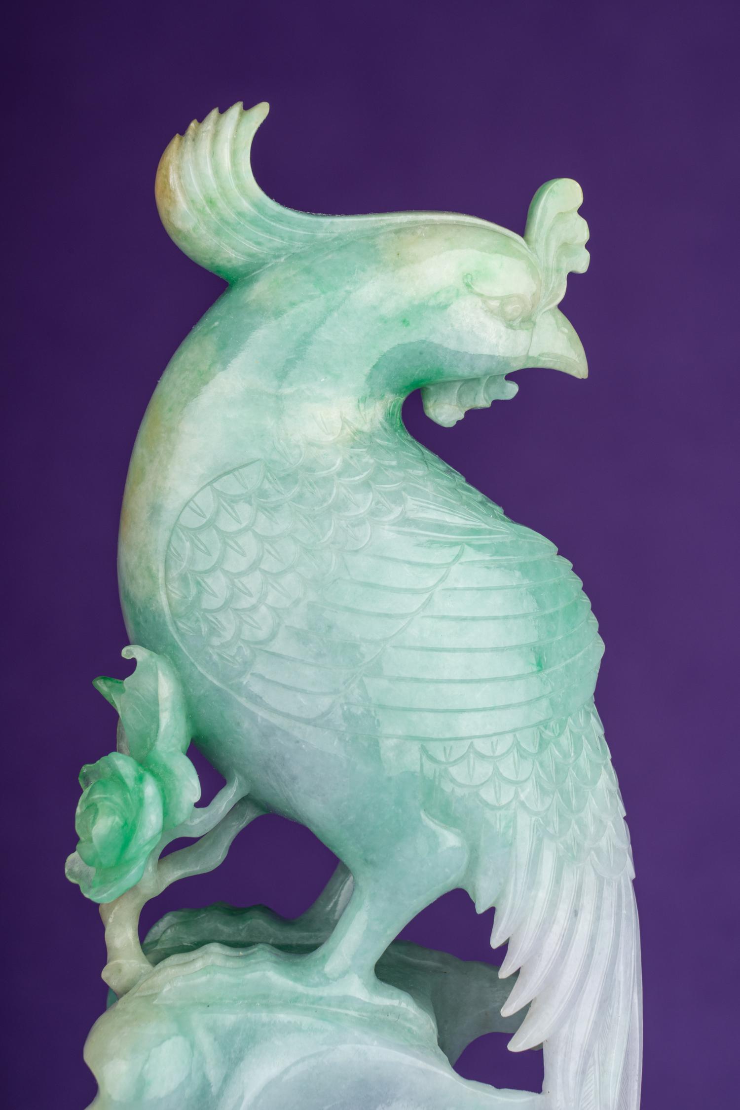 A Pair of Semi-Translucent Green Jadeite Figures of Phoenix
