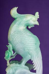 A Pair of Semi-Translucent Green Jadeite Figures of Phoenix
