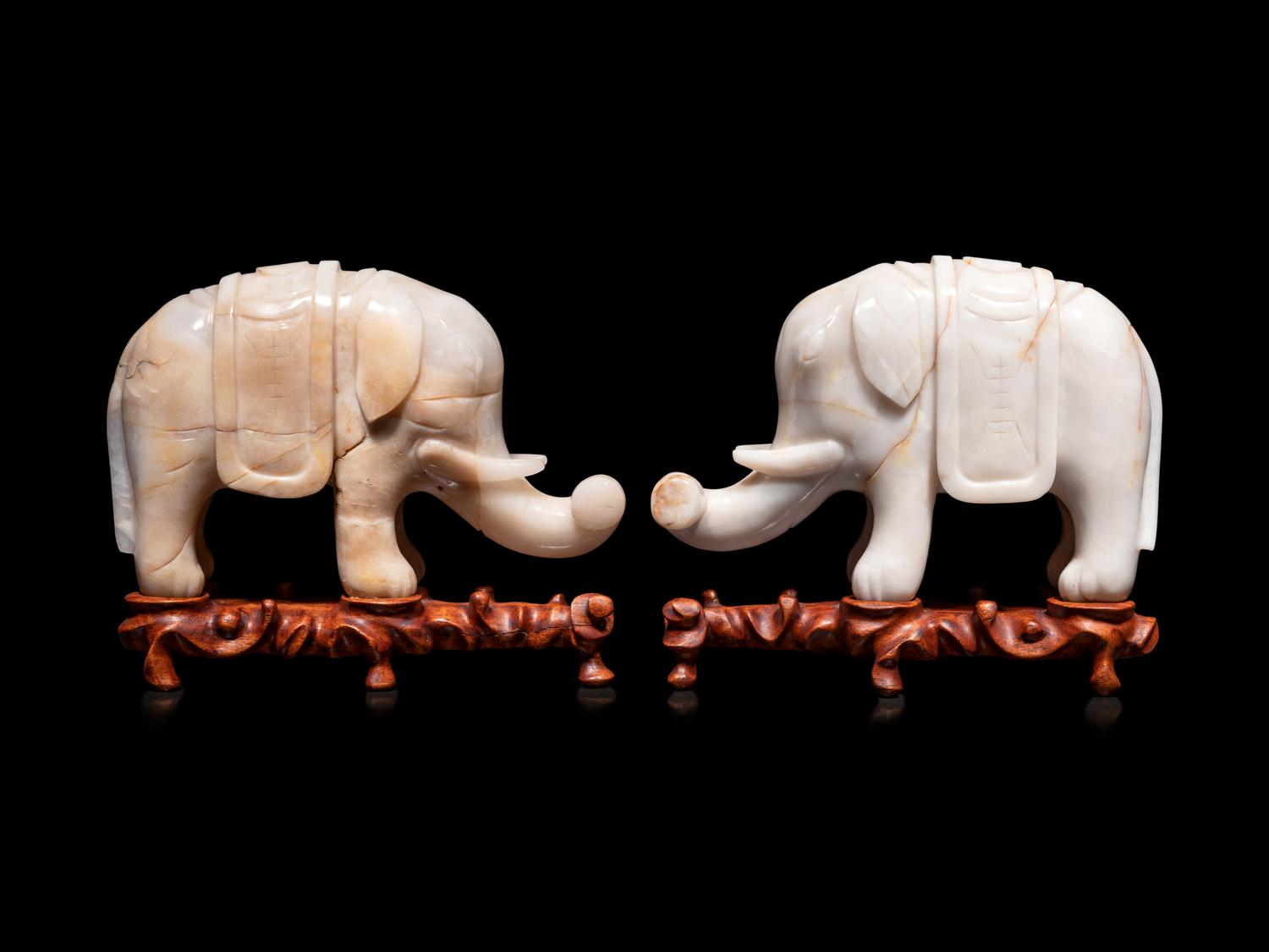 A Pair of Chinese Carved Hardstone Figures of Elephants