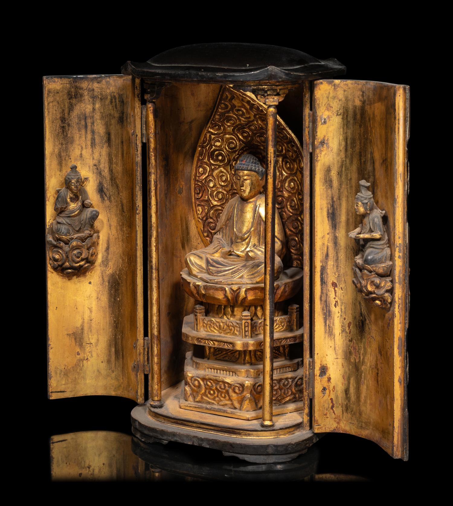 A Japanese Gilt and Black Lacquered Wood Buddhist Shrine with a Figure of a Seated Buddha
