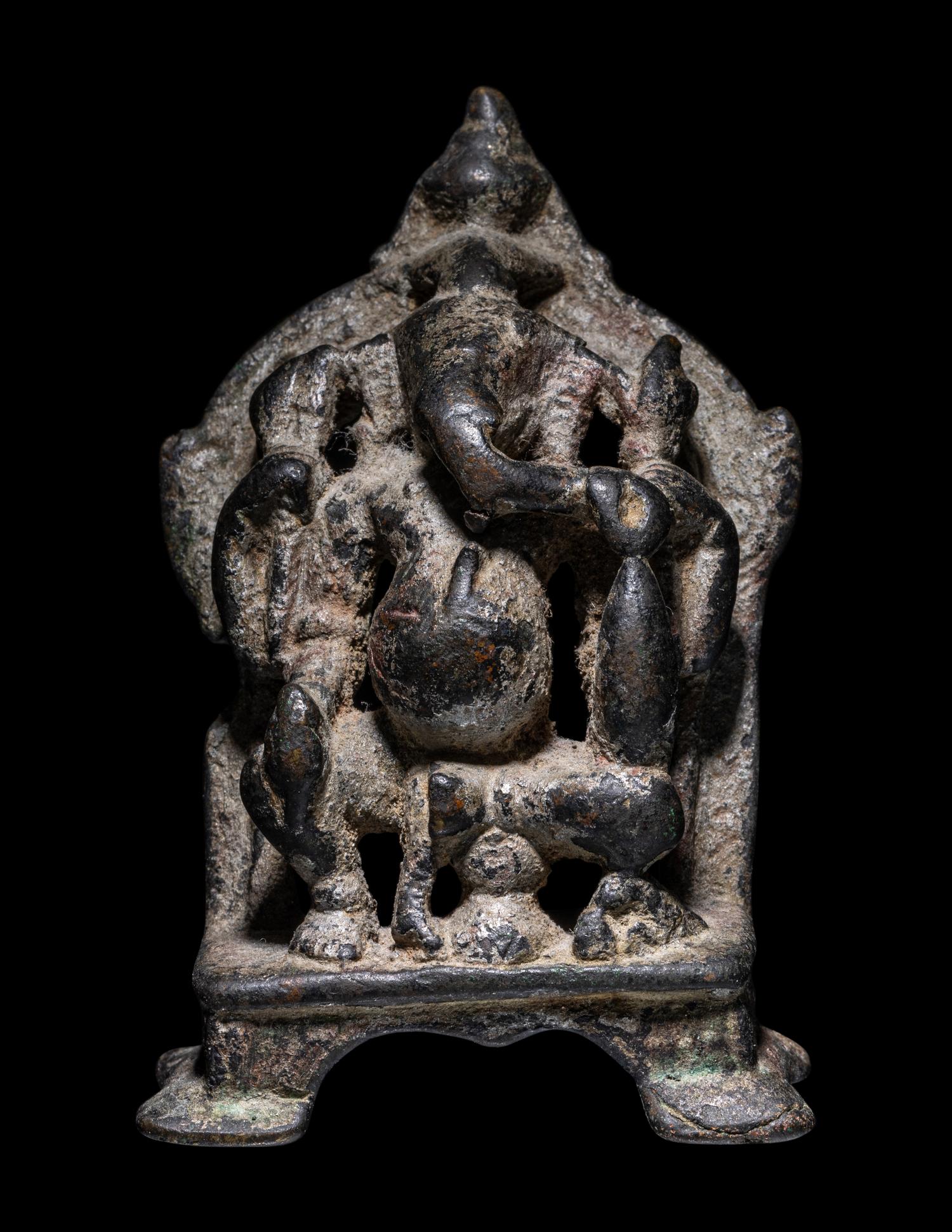An Indian Bronze Ganesha Enthroned