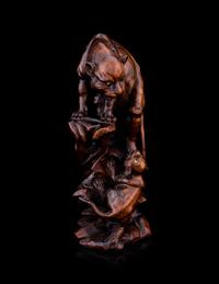 A Japanese Carved Wood Okimono
