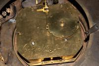 A Louis XV Gilt Bronze Cartel Clock