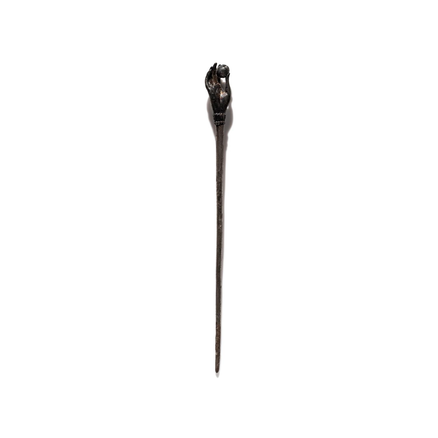 A Roman Silver Stickpin with a Hand and Pomegranate Finial