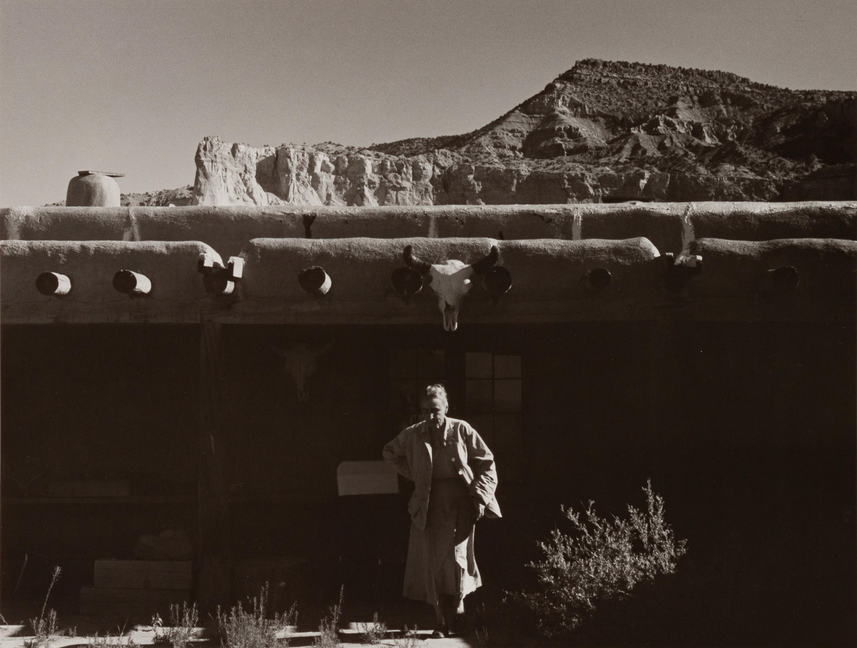 A group of four photographs ( O'Keeffe, Glen Canyon , 1961 (printed 1984); Georgia O'Keeffe Photographing the Chama River , 1961 (printed 1984); Untitled (O'Keeffe walking towards building) , 1960s; Untitled (O'Keeffe walking from building ), 1959 (printed 1984))