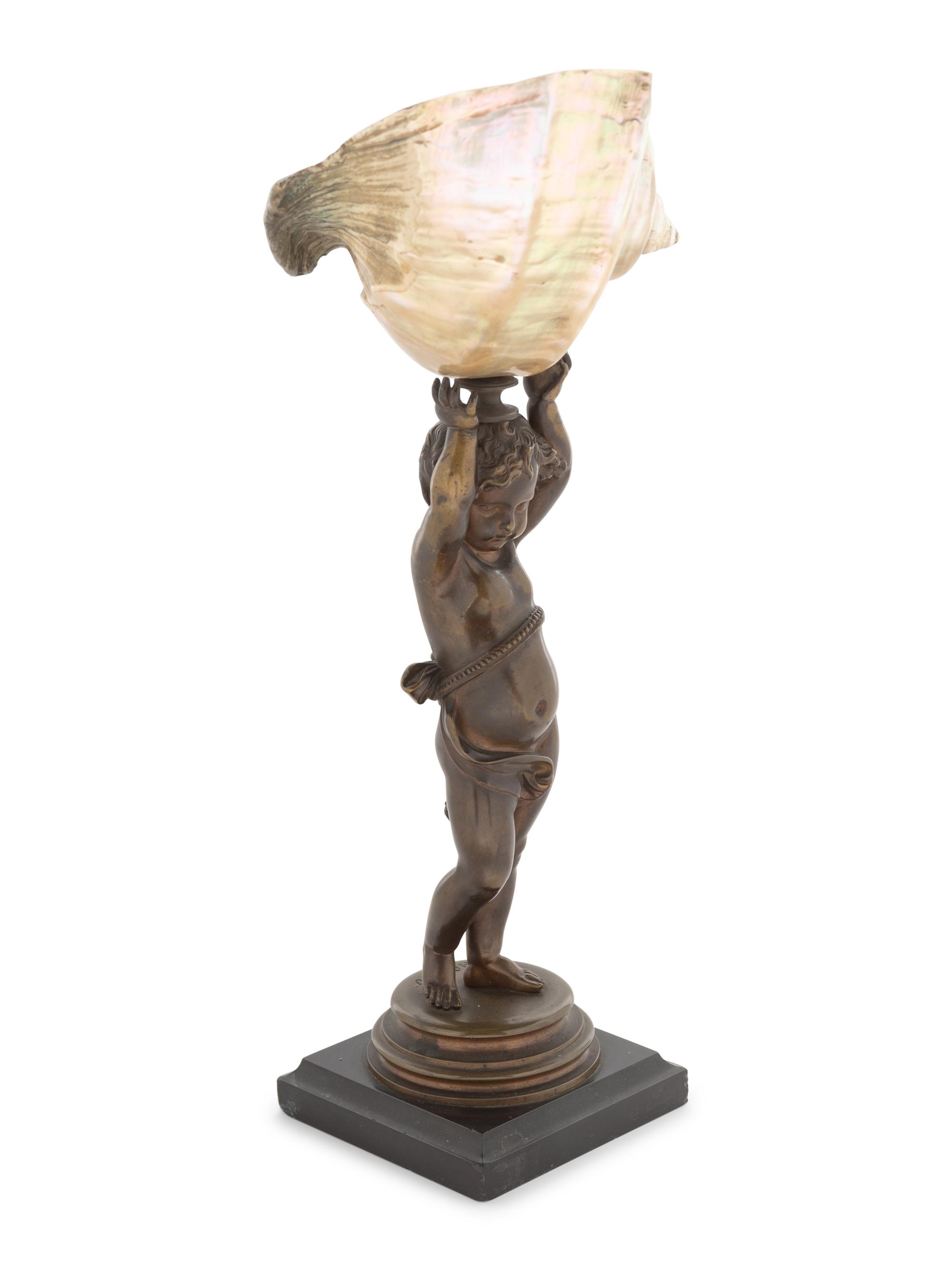 A Continental Bronze and Nautilus Shell Table Ornament