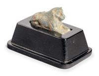 An Egyptian Faience Lion