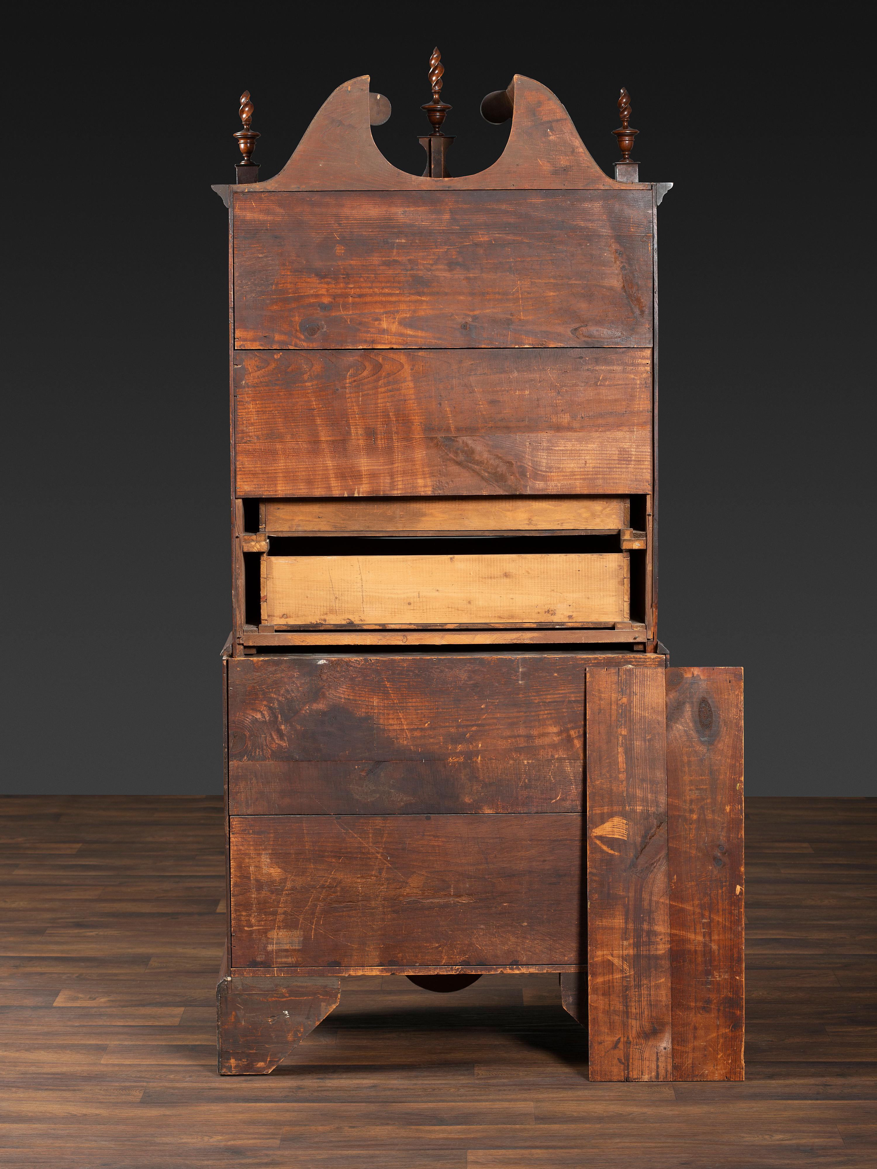 A Chippendale Style Shell and Rosette Carved Mahogany Block Front Chest-On-Chest