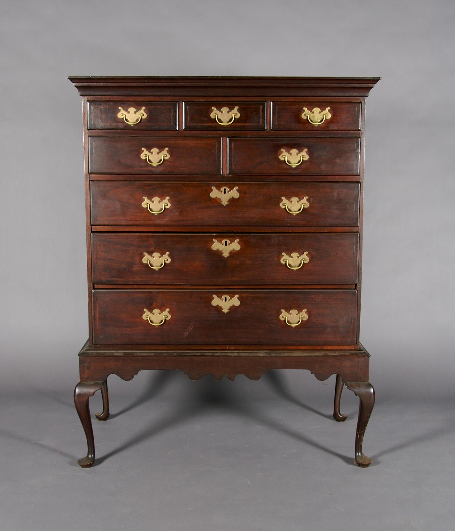 An American Mahogany Chest on Stand, Height 53 1/2 x width 41 1/4 x depth 22 1/4 inches.