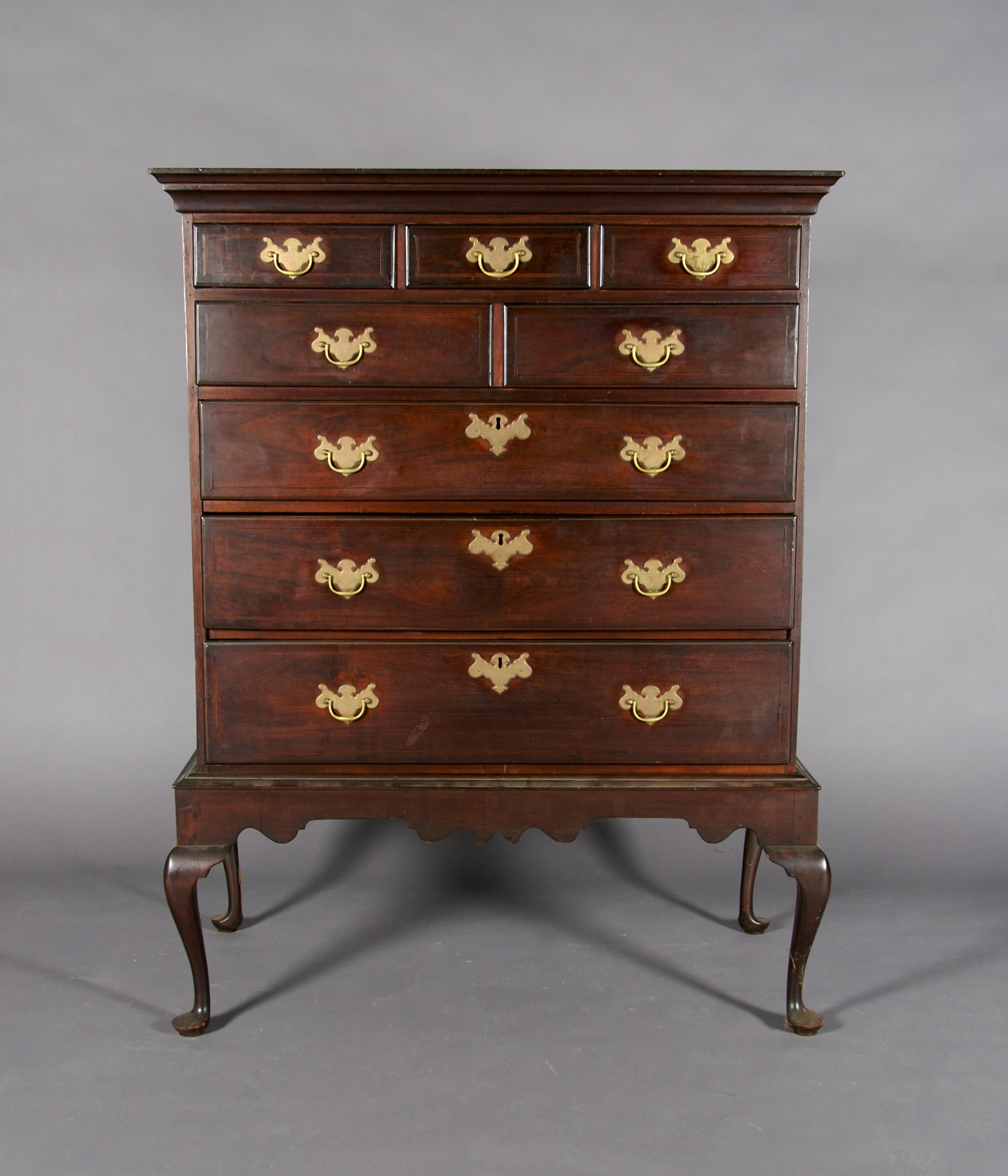 An American Mahogany Chest on Stand, Height 53 1/2 x width 41 1/4 x depth 22 1/4 inches.