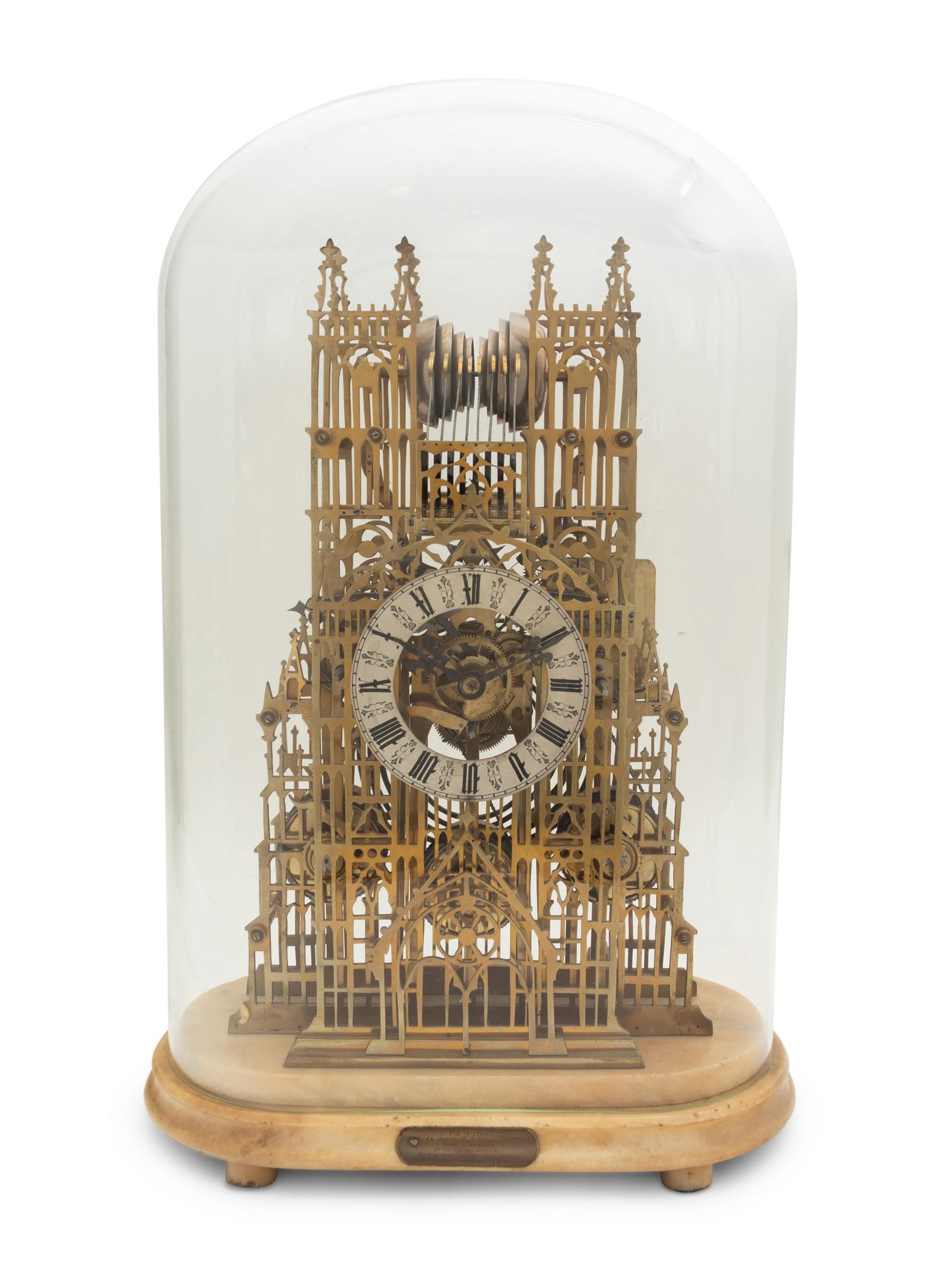 A Victorian Brass Cathedral-Form Skeleton Clock