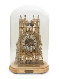 A Victorian Brass Cathedral-Form Skeleton Clock