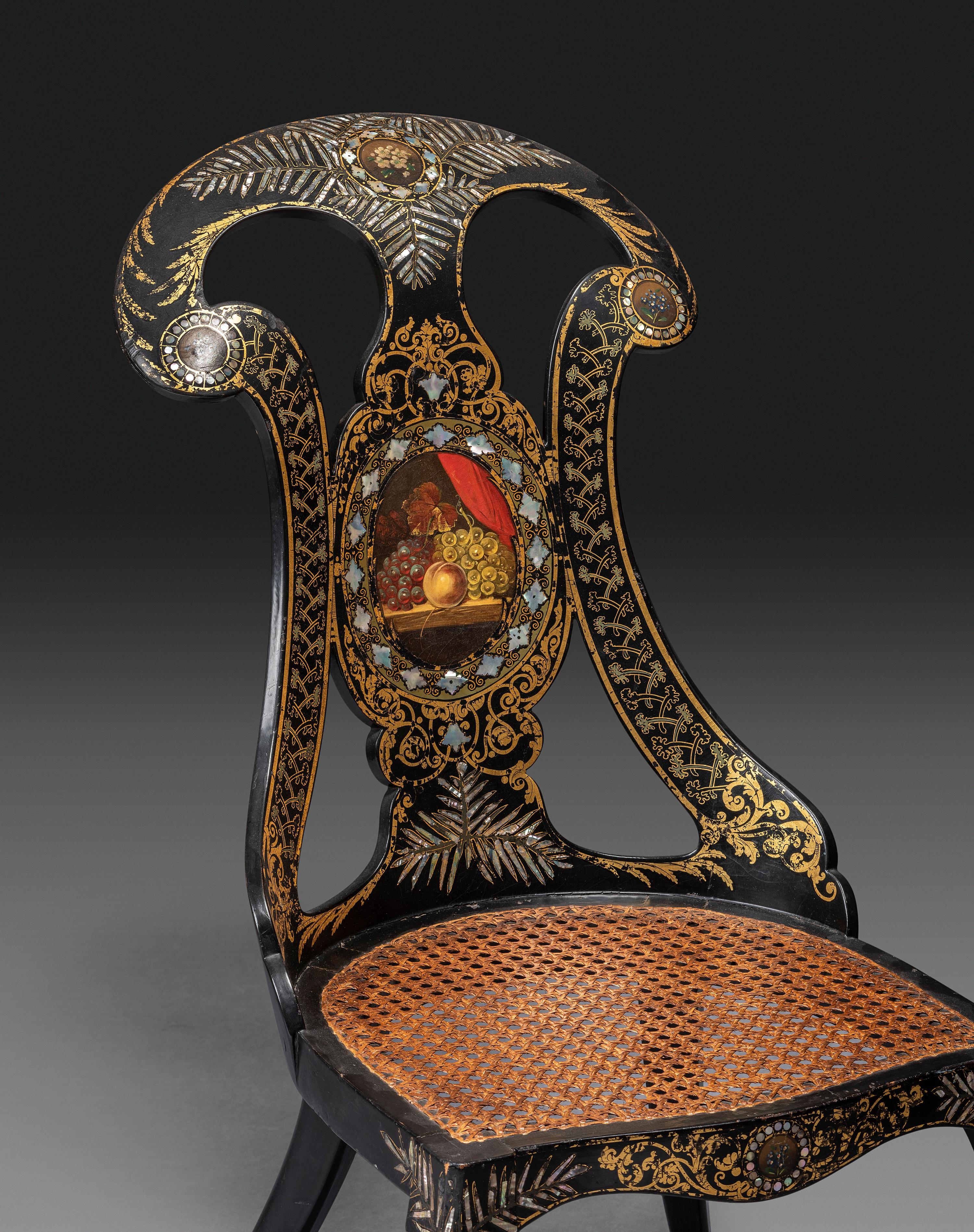 Two Victorian Black Lacquered Parcel-Gilt and Mother-of-Pearl Inlaid Cane Upholstered Slipper Chairs