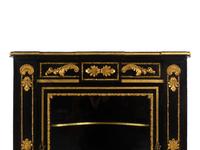 A Napoleon III Style Parcel Gilt and Ebonized Marble-Top Corner Cabinet